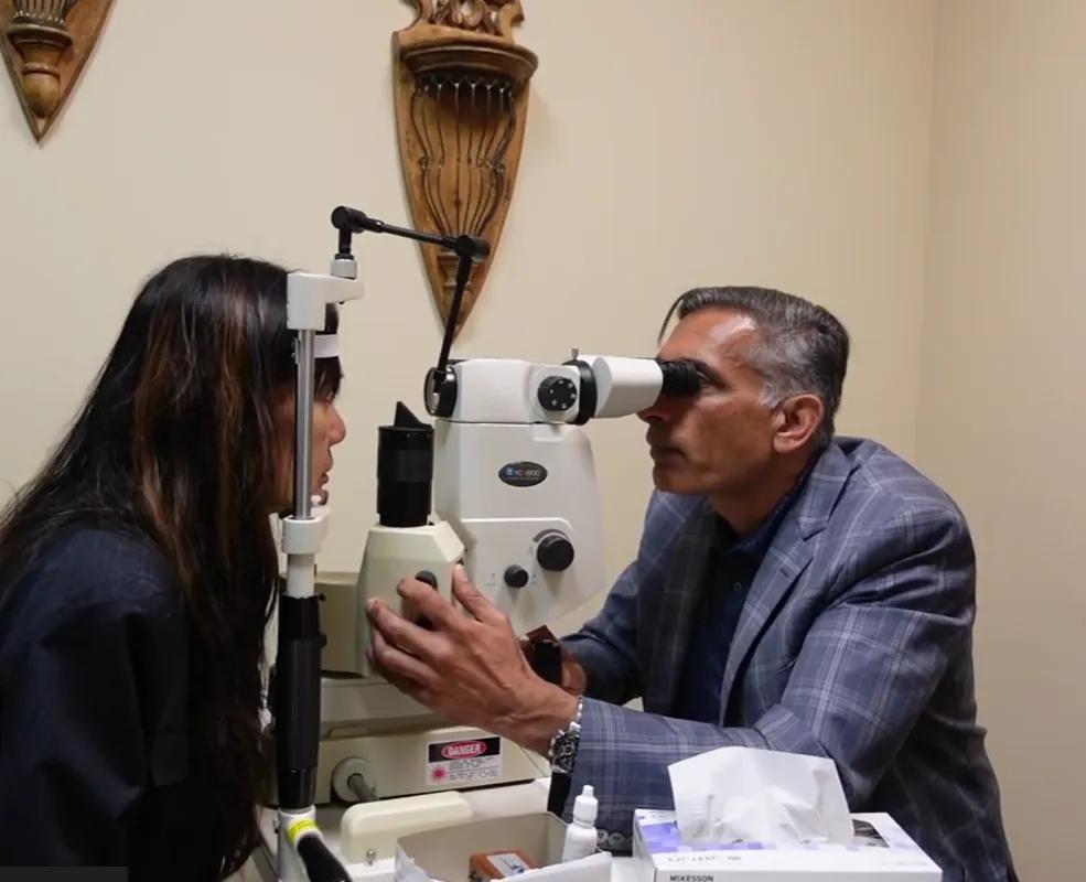 Dr. Ashraf helping a patient