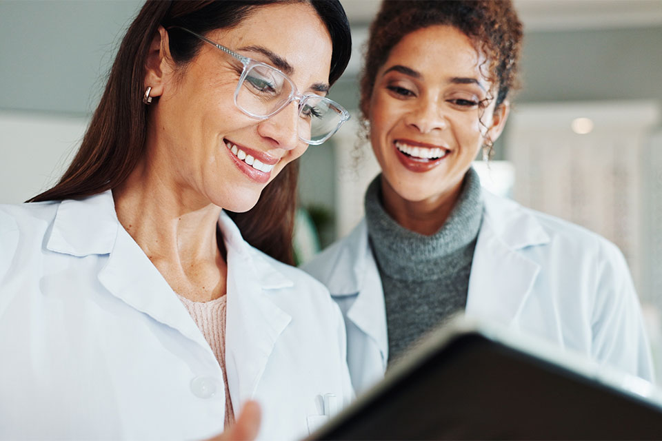 ophthalmologist reviewing eye exam results with a patient ophthalmologist reviewing eye exam results with a patient